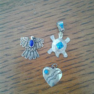 Sold as a set Vintage tiny Native American Looking pendants sterling